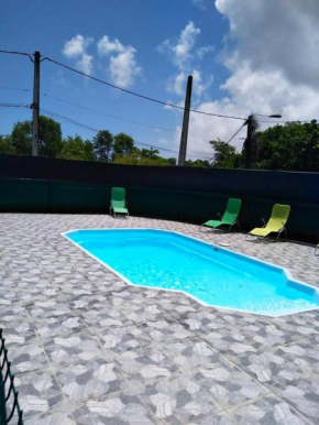 Maison charmante proche de la plage au Moule avec piscine